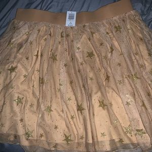 Gold/tan glitter star skater skirt from torrid